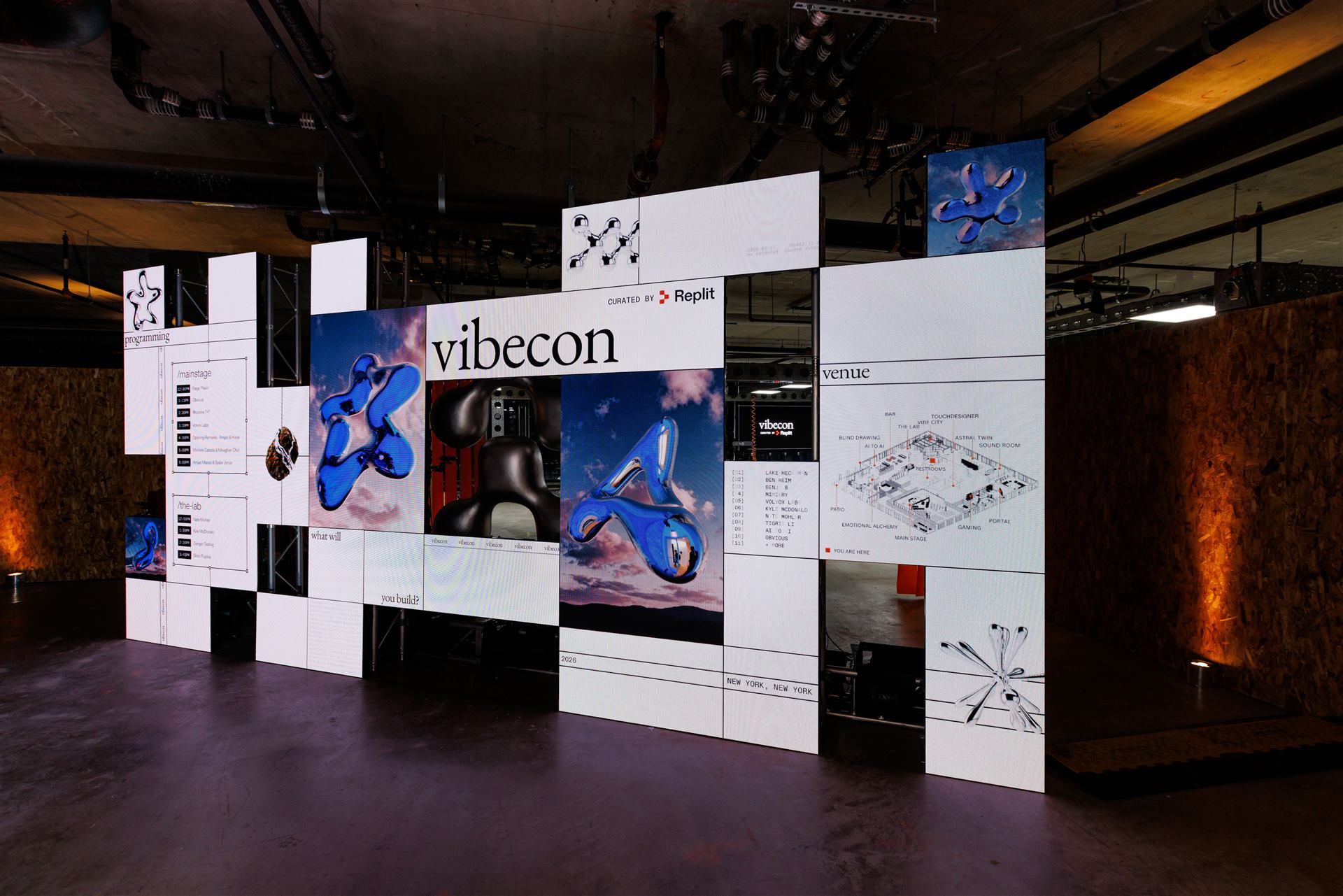 The Vibecon venue wayfinding wall, showing the conference's room layout
